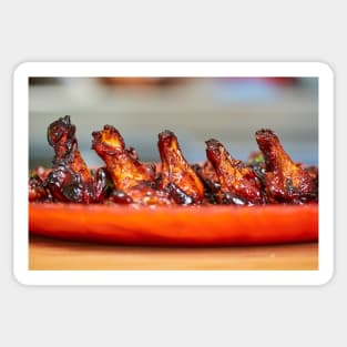 Caramelized chicken wings in closeup Sticker